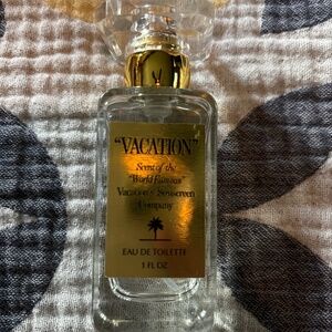 Vacation eau de toilette 1 ounce bottle 2/3 full